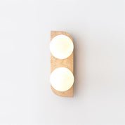 Lumen Neptune Travertine Wall Lamp