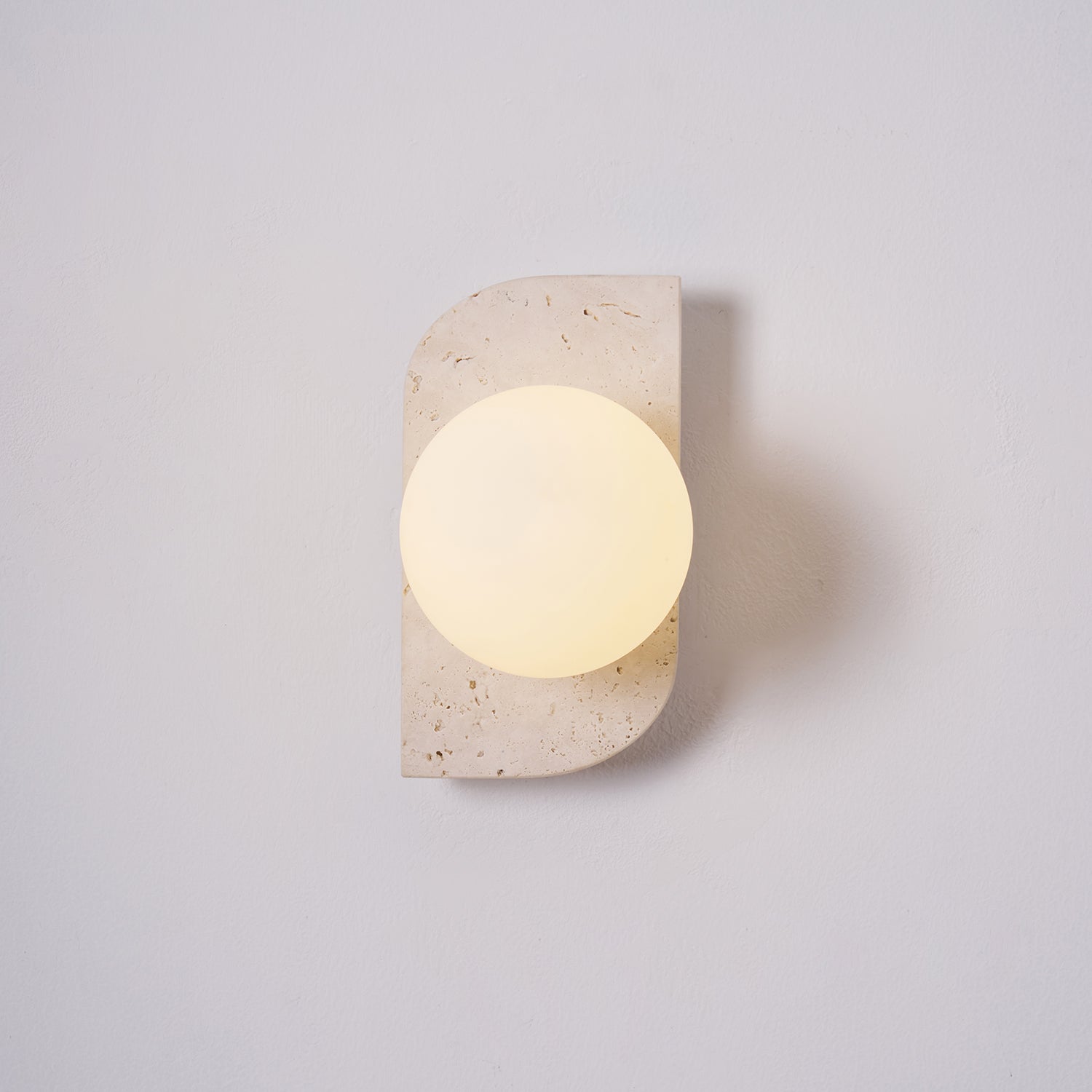 Lumen Neptune Travertine Wall Lamp