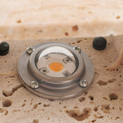 Lumen Travertine Outdoor Wall Lamp