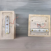 Lumen Travertine Outdoor Wall Lamp