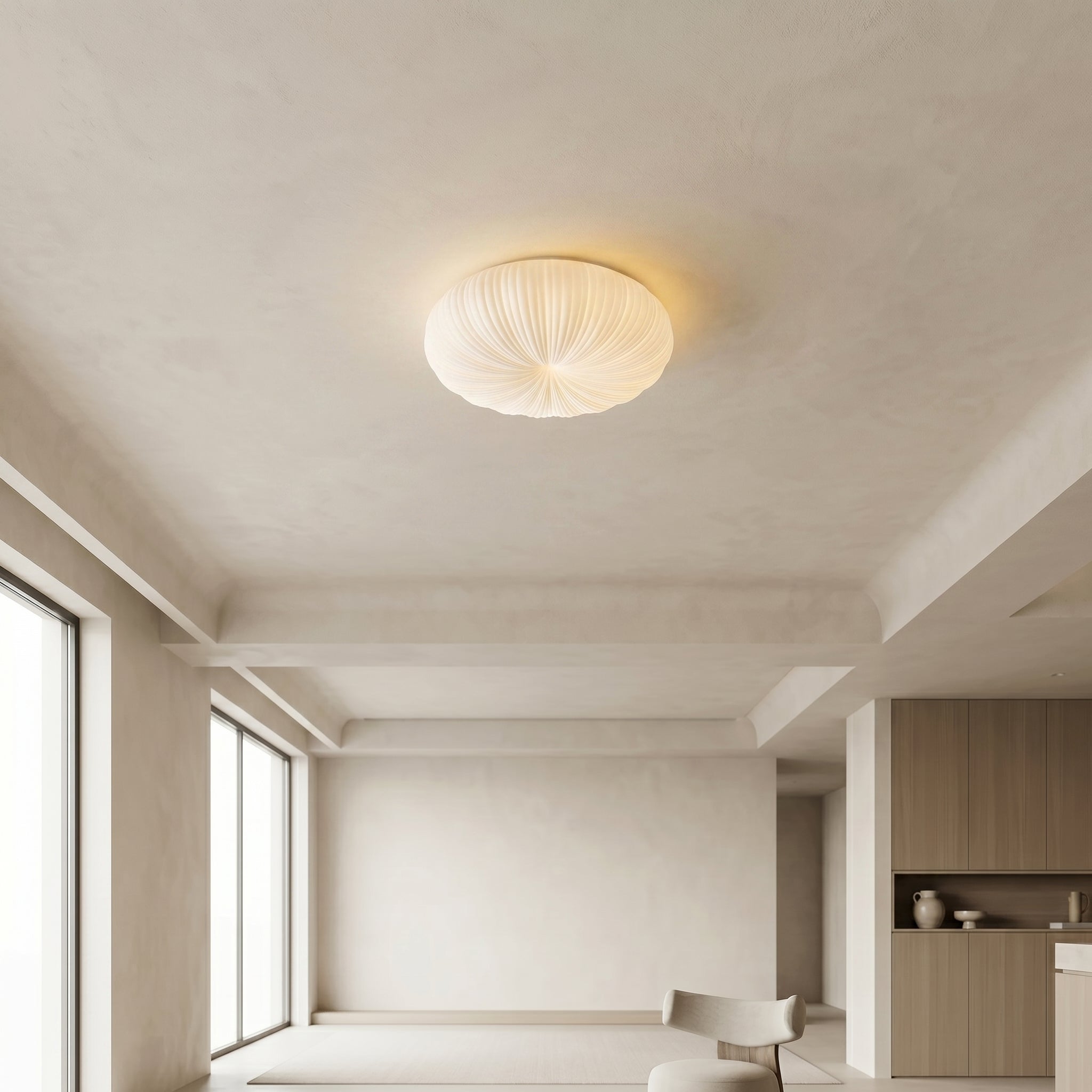 White Bobby flush ceiling light mounted in minimal beige living room with plaster ceiling and floor to ceiling windows